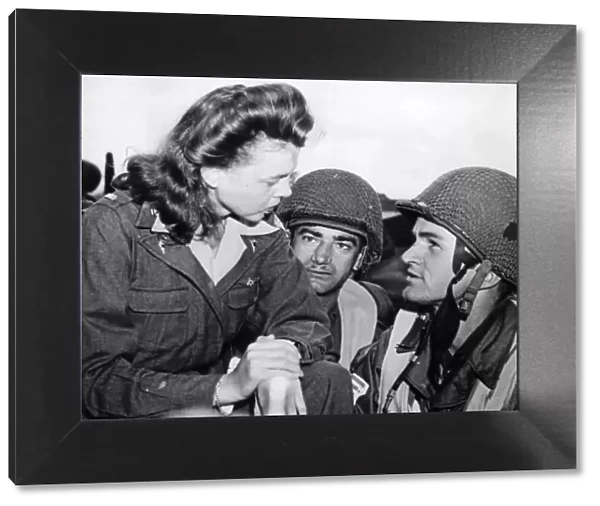 The Battle of Arnhem. American Paratroopers say goodbye to an Army nurse at an airport