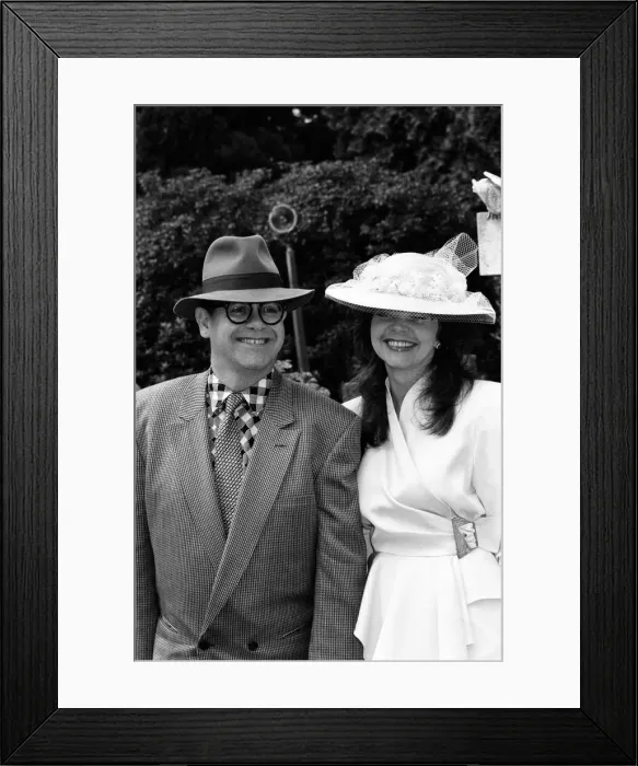 Framed Print : Elton John and his wife Renate at the wedding of Emma Forbes and Graham Clempson Framed Print : Elton John and his wife Renate at the wedding of Emma Forbes and Graham Clempson