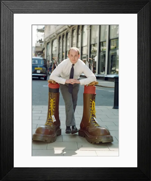 Framed Print : Sothebys auction of Elton John items. Eltons famous Doc Martin boots were Framed Print : Sothebys auction of Elton John items. Eltons famous Doc Martin boots were