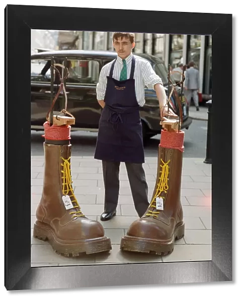 Sothebys auction of Elton John items. Eltons famous Doc Martin boots which he