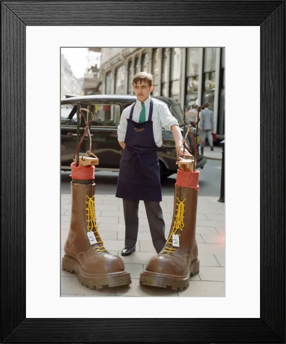Framed Print : Sothebys auction of Elton John items. Eltons famous Doc Martin boots which he Framed Print : Sothebys auction of Elton John items. Eltons famous Doc Martin boots which he