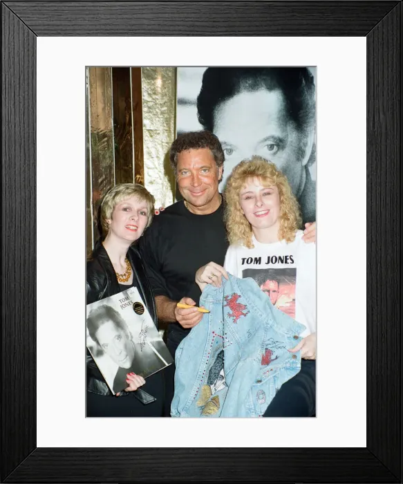 Framed Print : Tom Jones poses with fans Kathy Hall and Rosina Sims at HMV Oxford Street Framed Print : Tom Jones poses with fans Kathy Hall and Rosina Sims at HMV Oxford Street