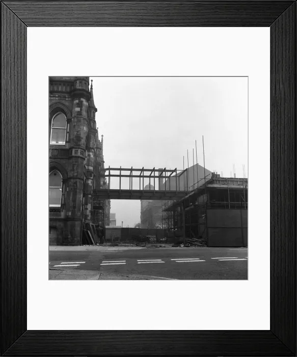 Framed Print : Bridge lifted into position to join old and new town hall. Circa 1971