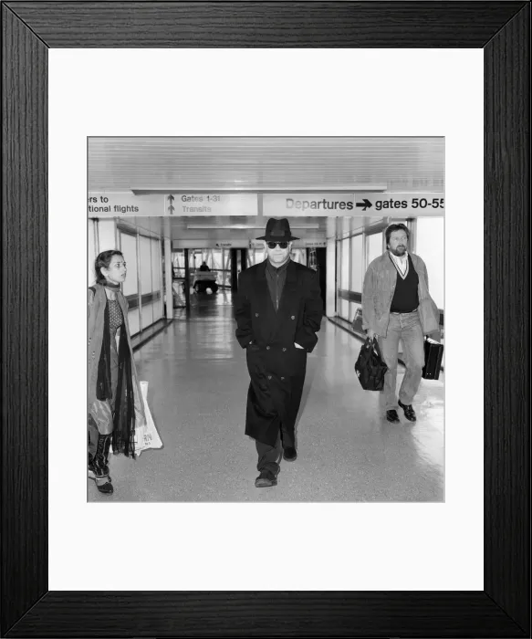 Framed Print : Elton John at Heathrow Airport, London. 26th August 1987 Framed Print : Elton John at Heathrow Airport, London. 26th August 1987