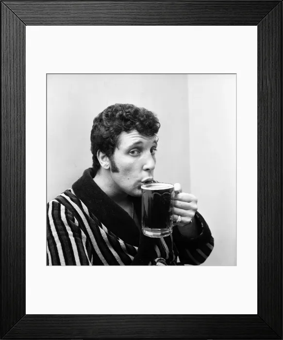 Framed Print : Singer Tom Jones drinking a pint of beer at Cesars Palace Nightclub Framed Print : Singer Tom Jones drinking a pint of beer at Cesars Palace Nightclub
