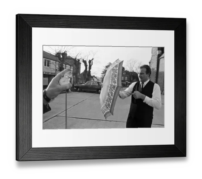 Framed Print : The Brolley Challenger - Jim Carver, of Orpington, taking an umbrella out of a case Framed Print : The Brolley Challenger - Jim Carver, of Orpington, taking an umbrella out of a case