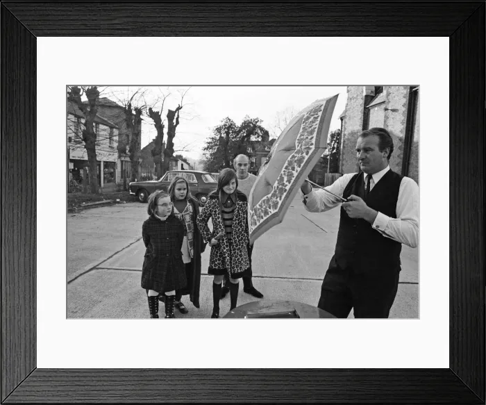 Framed Print : The Brolley Challenger - Jim Carver, of Orpington, taking an umbrella out of a case Framed Print : The Brolley Challenger - Jim Carver, of Orpington, taking an umbrella out of a case