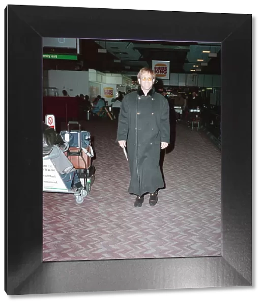Elton John leaving Heathrow Airport on Concorde for New York
