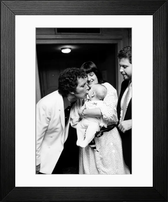 Framed Print : Tom Jones with his grandson Alexander, aged eleven months Framed Print : Tom Jones with his grandson Alexander, aged eleven months