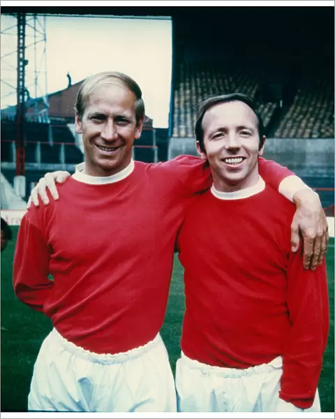 Bobby Charlton (left) with his Manchester United team mate, Nobby Stiles at Old Trafford
