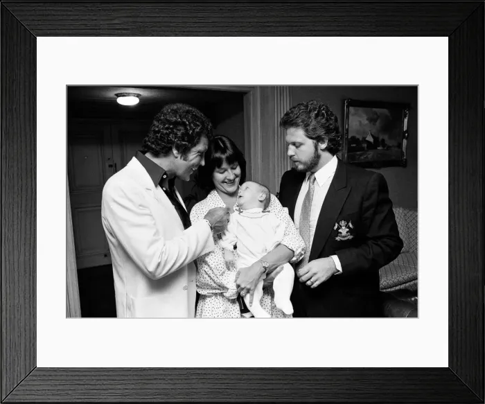 Framed Print : Tom Jones with his grandson Alexander, aged eleven months Framed Print : Tom Jones with his grandson Alexander, aged eleven months