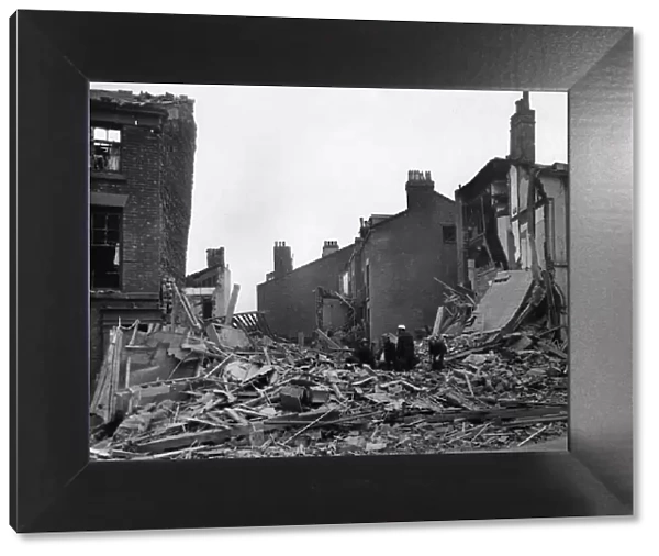 The wreckage of a house in Liverpool after air raids this morning