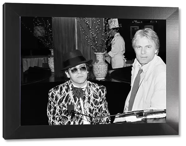 Elton John and Adam Faith at The Savoy, London. 1985