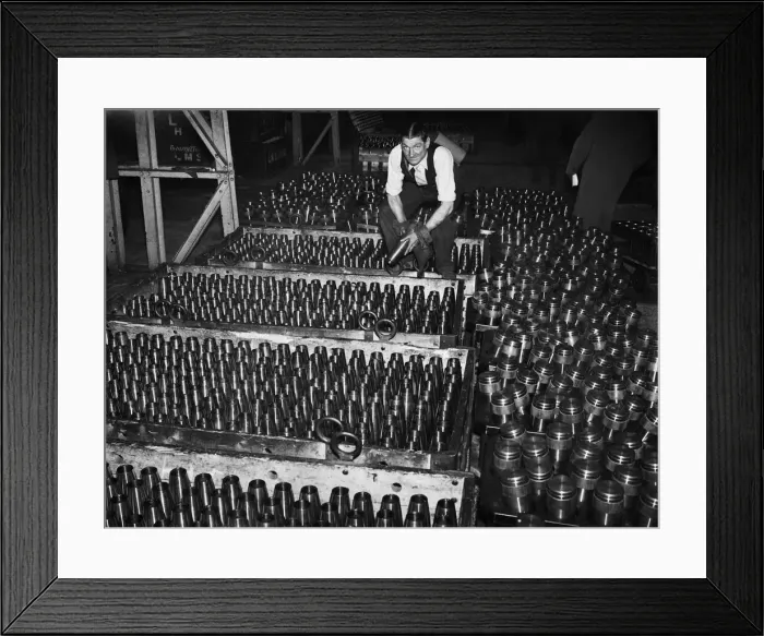 Framed Print : Stacking shells for anti-aircraft guns in a midland shell factory. 4th October 1939 Framed Print : Stacking shells for anti-aircraft guns in a midland shell factory. 4th October 1939