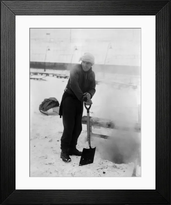 Framed Print : Grounds staff at Bristol Rovers Eastville Stadium struggle to clear snow from the pitch