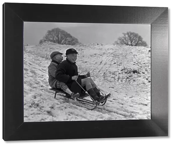 Children enjoying the snow in a Bristol park 31st December 1961