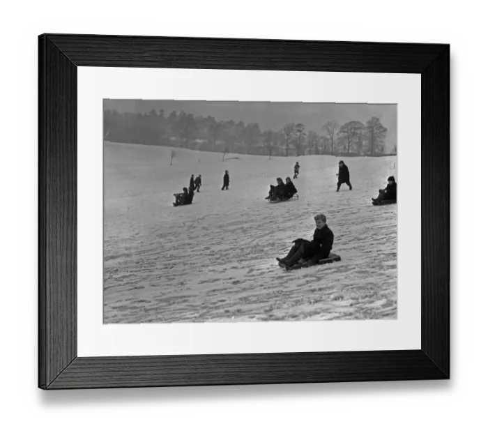Framed Print : Children enjoying the snow in a Bristol park 31st December 1961 Framed Print : Children enjoying the snow in a Bristol park 31st December 1961