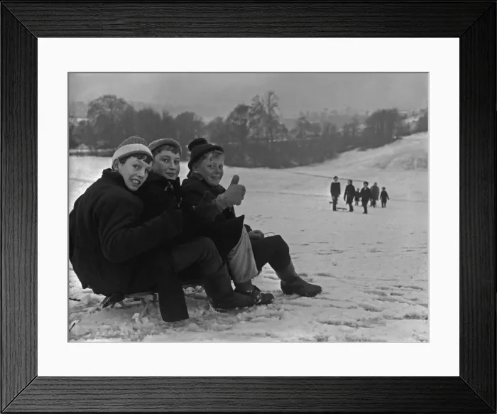 Framed Print : Children enjoying the snow in a Bristol park 31st December 1961