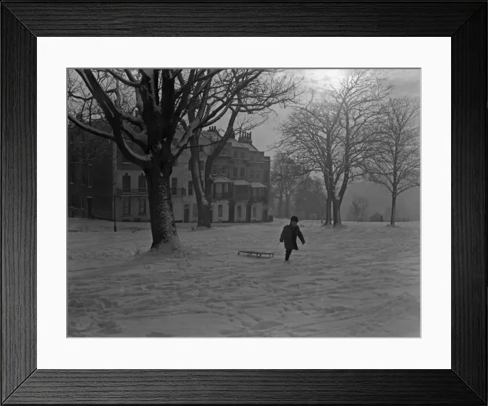 Framed Print : A young boy pulls his sledge up Sion Hill, Clifton, Bristol. 1st January 1962 Framed Print : A young boy pulls his sledge up Sion Hill, Clifton, Bristol. 1st January 1962