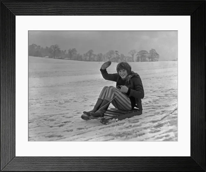 Framed Print : Teenager enjoying the snow in a Bristol park 31st December 1961 Framed Print : Teenager enjoying the snow in a Bristol park 31st December 1961