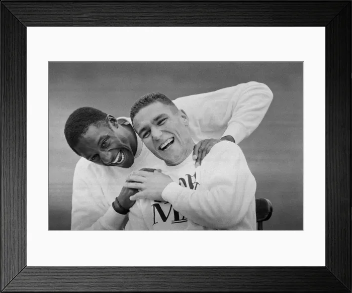Framed Print : Vinnie Jones (right) and John Fashanu pictured during a photocall for Wimbledon Football