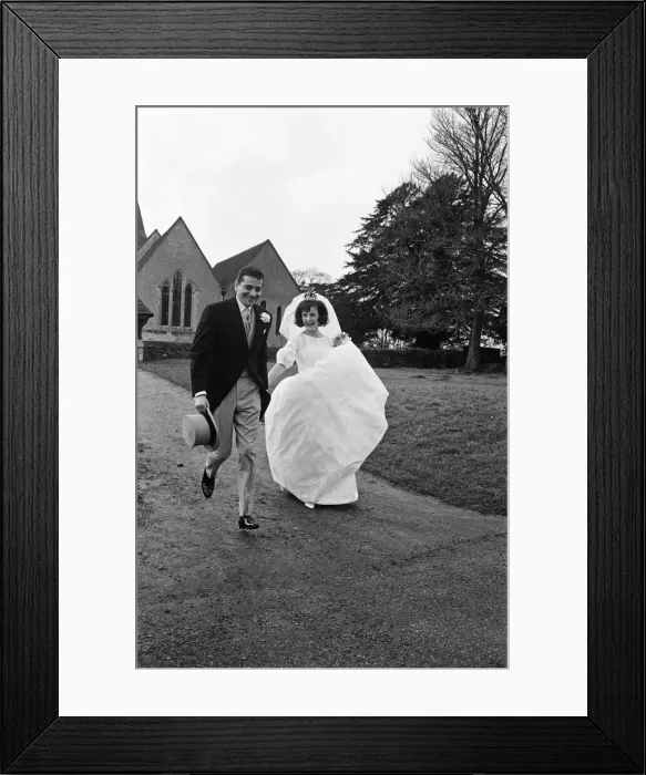 Framed Print : The wedding of John Kennedy to model Paula Noble. They are married at St James