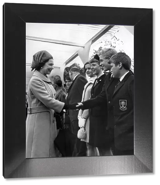 Queen Elizabeth II meets schoolboys Graham Booth and Paul Allen, both 13