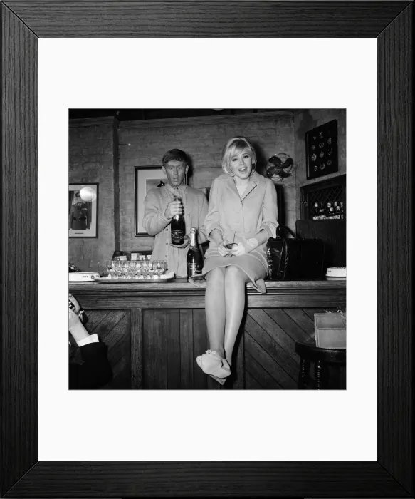 Framed Print : Britt Ekland and John Leyton at a photocall for their new film Guns at Batasi Framed Print : Britt Ekland and John Leyton at a photocall for their new film Guns at Batasi