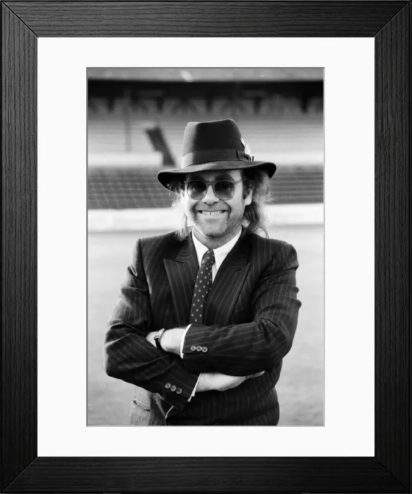 Framed Print : Elton John, Watford FC chairman, and pop star. 12th December 1985 Framed Print : Elton John, Watford FC chairman, and pop star. 12th December 1985