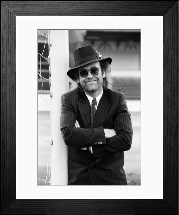 Framed Print : Elton John, Watford FC chairman, and pop star. 12th December 1985 Framed Print : Elton John, Watford FC chairman, and pop star. 12th December 1985