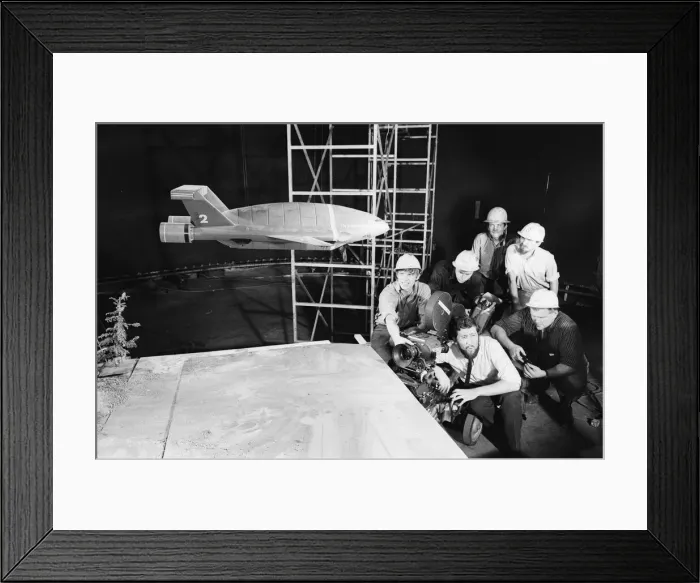 Framed Print : Thunderbird II takes off in Slough film studios during filming of the Thunderbirds series Framed Print : Thunderbird II takes off in Slough film studios during filming of the Thunderbirds series