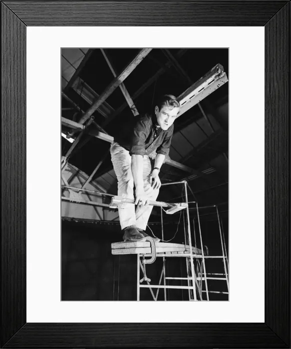 Framed Print : Thunderbird II takes off in Slough film studios during filming of the Thunderbirds series Framed Print : Thunderbird II takes off in Slough film studios during filming of the Thunderbirds series