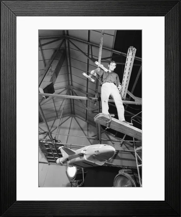 Framed Print : Thunderbird II takes off in Slough film studios during filming of the Thunderbirds series Framed Print : Thunderbird II takes off in Slough film studios during filming of the Thunderbirds series