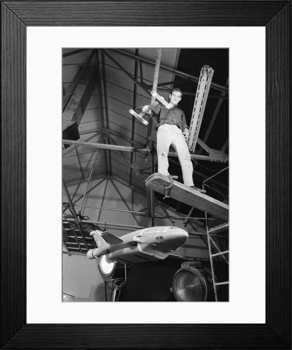 Framed Print : Thunderbird II takes off in Slough film studios during filming of the Thunderbirds series Framed Print : Thunderbird II takes off in Slough film studios during filming of the Thunderbirds series