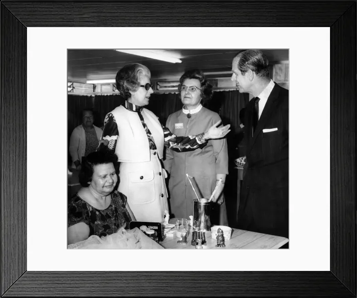 Framed Print : Prince Philip, Duke of Edinburgh is shown the handicrafts room at Heathlands Framed Print : Prince Philip, Duke of Edinburgh is shown the handicrafts room at Heathlands
