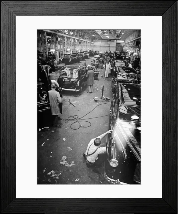Framed Print : Carbodies factory, producing The London Taxi. The London Taxi Company was a taxi