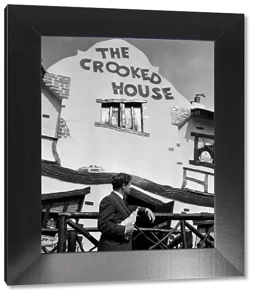 People enjoying their holidays in Southend, Essex. The Crooked House attraction