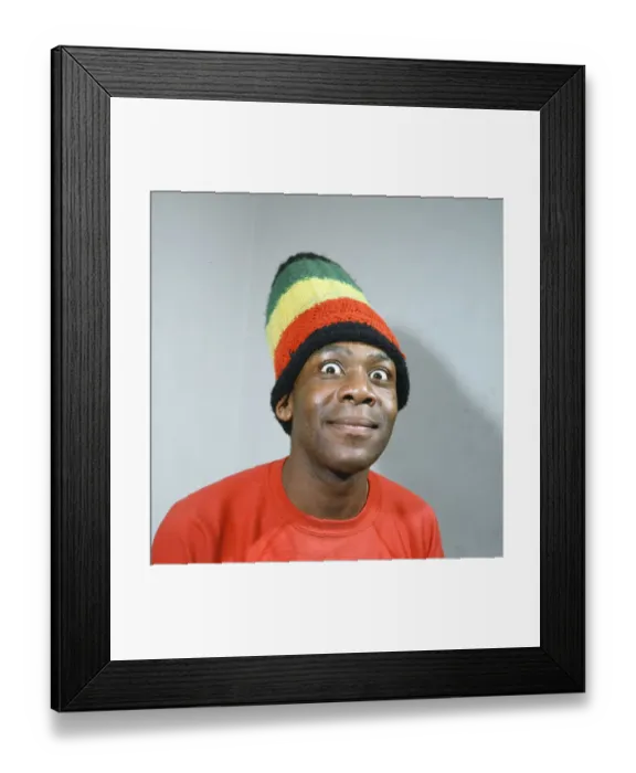 Framed Print : Lenny Henry. Pictured in 1984, wearing his Rastacap