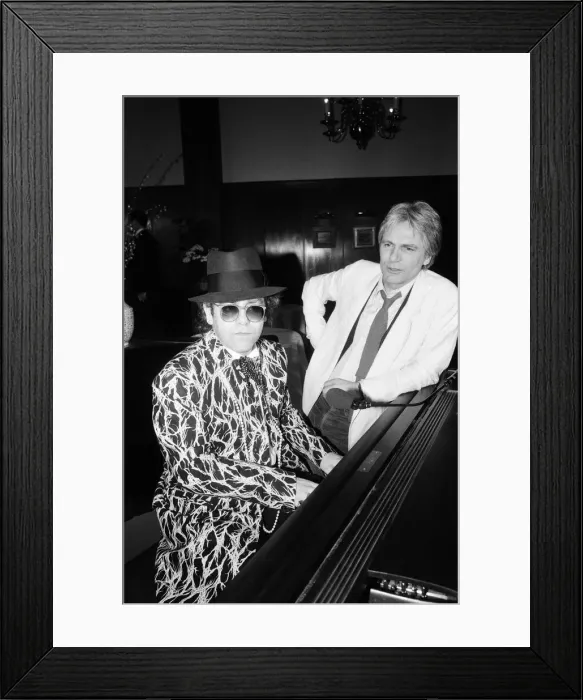 Framed Print : Elton John and Adam Faith at The Savoy, London. 1985 Framed Print : Elton John and Adam Faith at The Savoy, London. 1985
