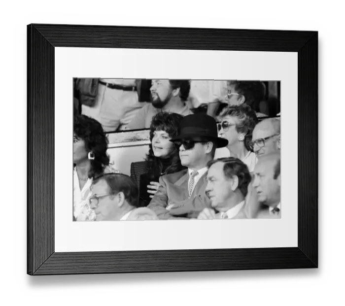 Framed Print : Elton John and his wife Renate watching his team, Watford, play Tottenham Hotspur