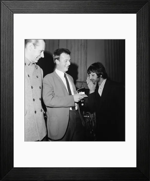 Framed Print : Beatles drummer Ringo Starr presents a Grammy Award to 22-year-old EMI recording engineer Framed Print : Beatles drummer Ringo Starr presents a Grammy Award to 22-year-old EMI recording engineer