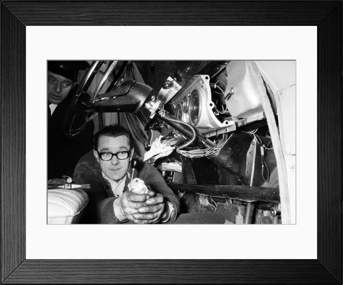 Framed Print : The hamster which was steadily eating its way through the minicab of John Daly has