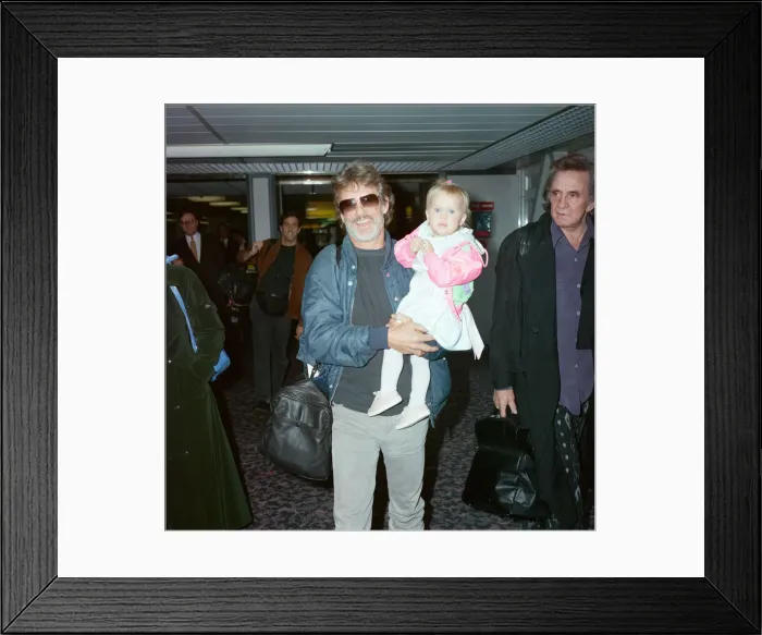 Framed Print : Members of The Highwaymen at Heathrow Airport. Kris Kristofferson