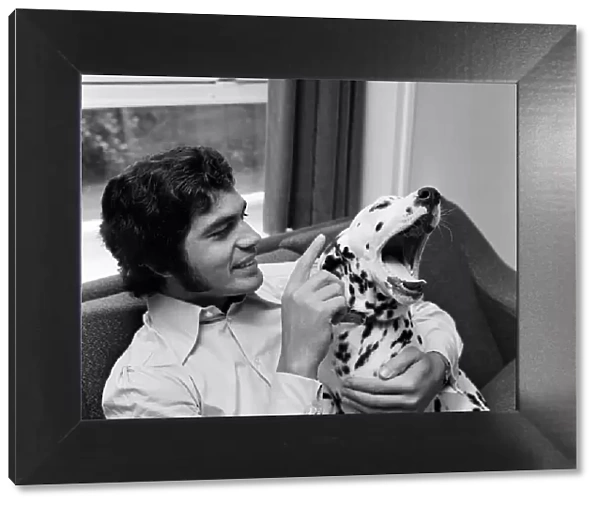 Engelbert Humperdinck at home with his Dalmatian dog. 5th July 1968