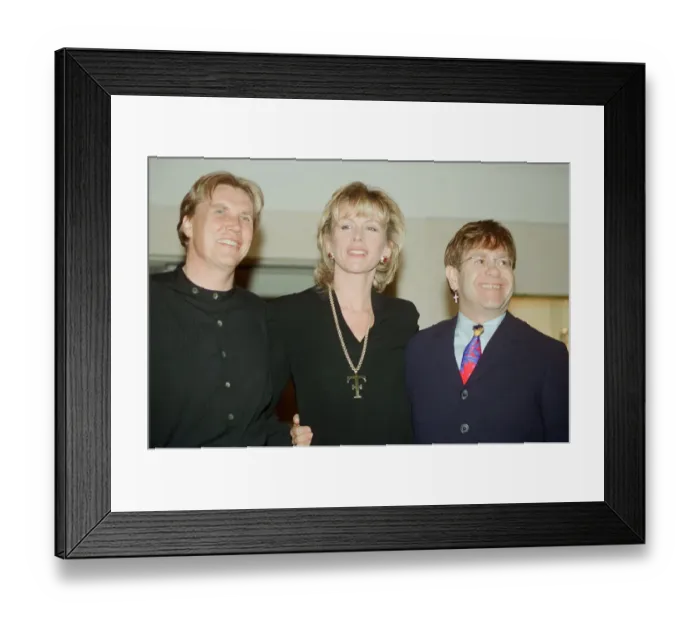 Framed Print : Theo and Louise Fennell with Elton John at the opening of Theo Fennell s