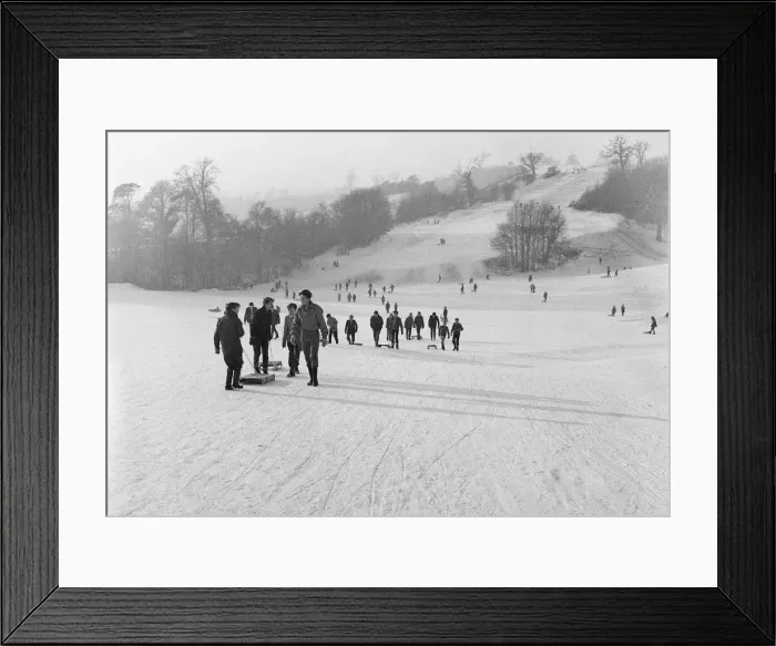 Framed Print : Children take the slopes of a Bristol park after a fresh fall of snow. 2nd January 1962 Framed Print : Children take the slopes of a Bristol park after a fresh fall of snow. 2nd January 1962