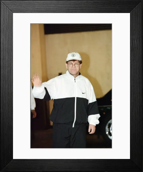 Framed Print : Elton John leaving the Wellington Hospital after having a pacemaker fitted