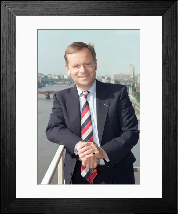 Framed Print : Jeffrey Archer, pictured on a balcony overlooking the River Thames. 12th June 1992
