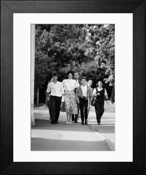 Framed Print : Mary and Jeffrey Archer walking home from church with their sons William and James Framed Print : Mary and Jeffrey Archer walking home from church with their sons William and James