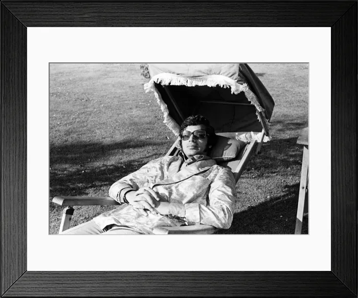 Framed Print : Pop singer Englebert Humperdinck relaxing in the garden of his county house near Great